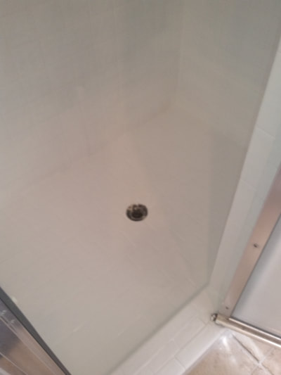 Dallas Bathtub Services tile shower pan resurfacing.